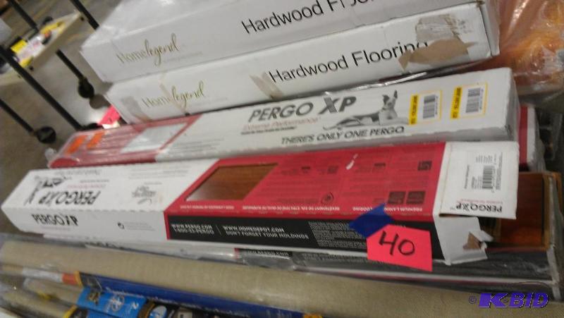 lot 40 image: Pergo Flooring. 6 boxes. Mohogany, Maple and ...