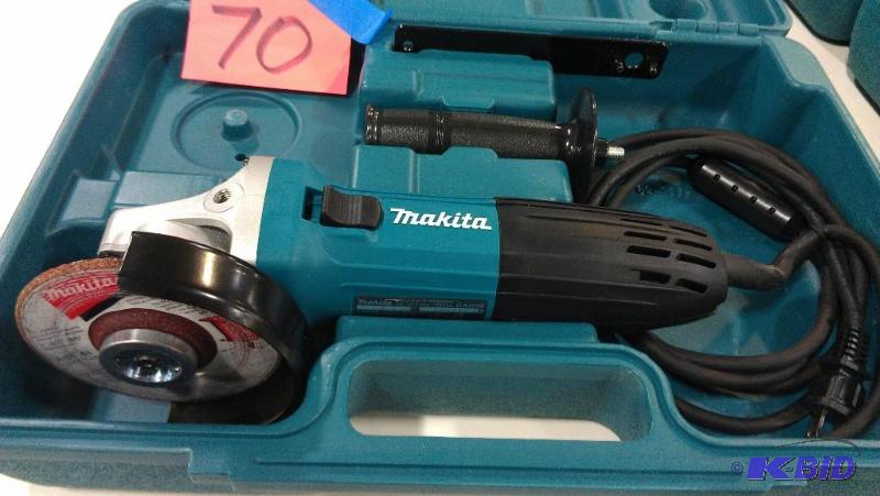 lot 70 image: Makita 4" Angle Grinder with case cuttin...