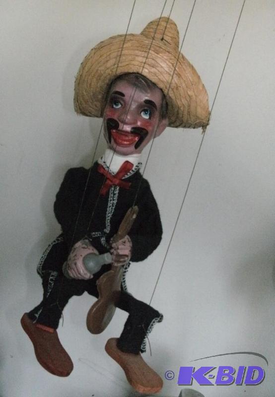 A Mexican Marionette Puppet. He has his guita...
