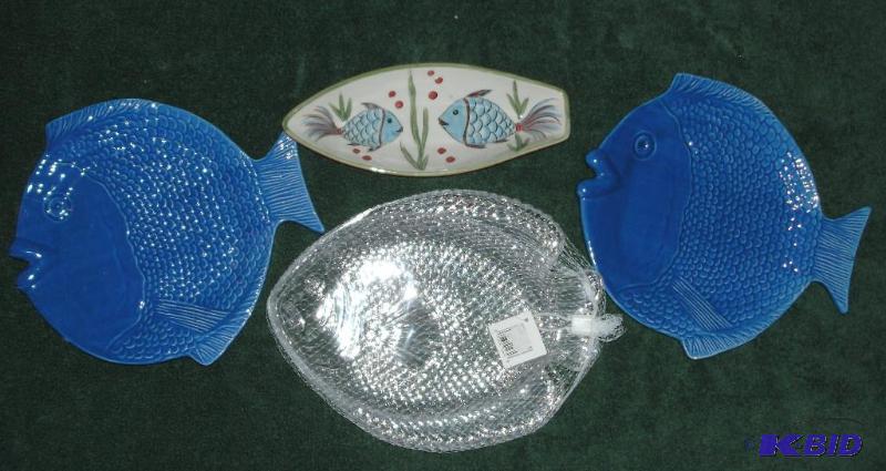 Fish dishes. Blue fish plates are glass and m...