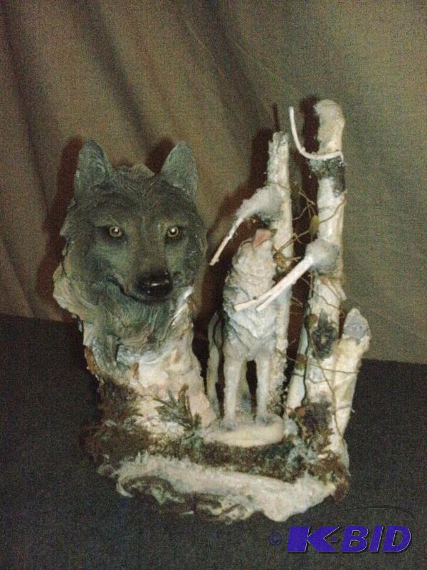 Interesting and touching wolf sculpture. May ...