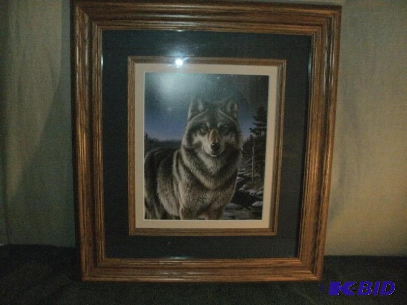Awesome framed artwork of a wolf under the st...