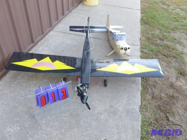 2 gas powered airplanes. One with motor as sh...