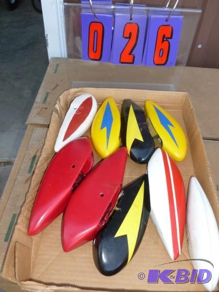 Flat of misc. wheel covers. Some new. Some us...