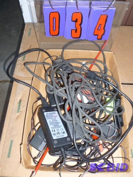 Flat of misc. transformers and charging cords...