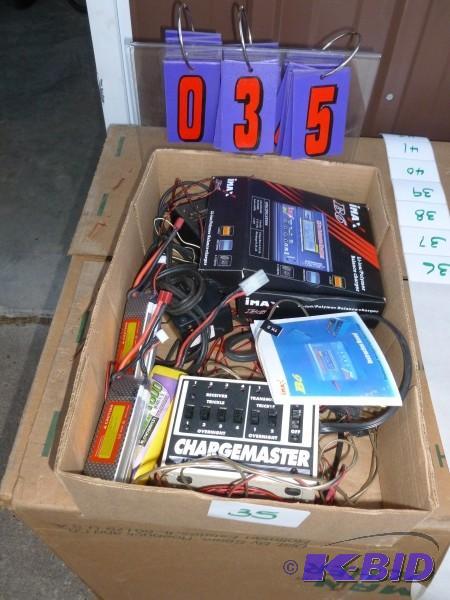 Flat of chargers and battery packs. As shown....