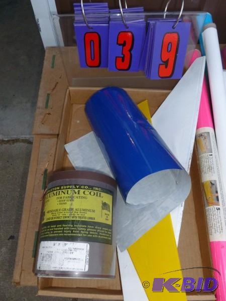 Flat of airplane materials and rolls of mono ...