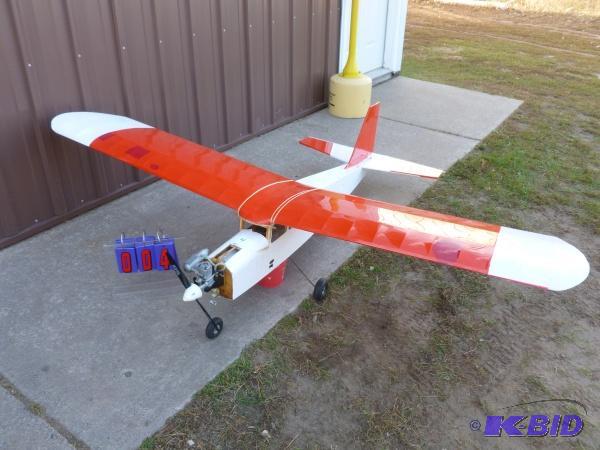 Large gas powered air plane with motor as sho...