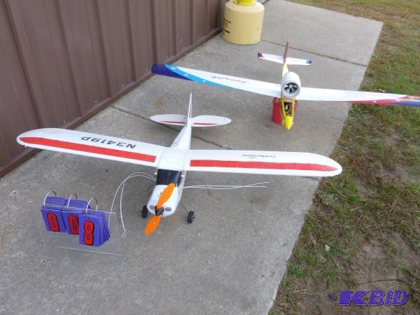 2 mid size electric airplanes as shown. Overa...