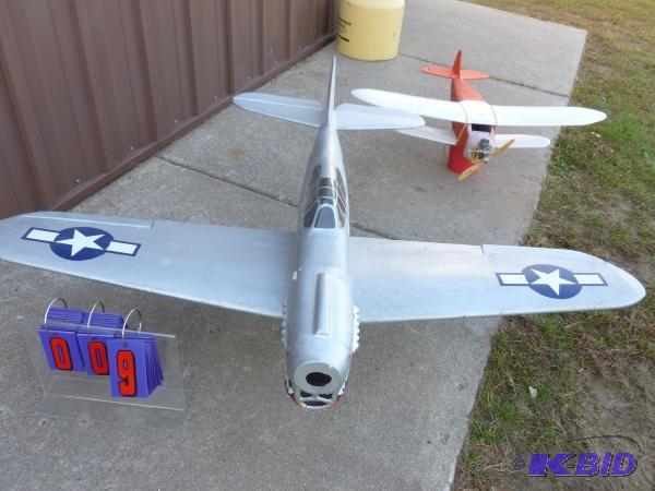 2 gas powered airplanes. One with motor. One ...