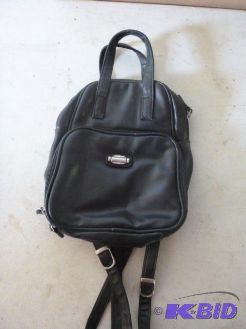 lot 138 image: Mini Leather Backpack...