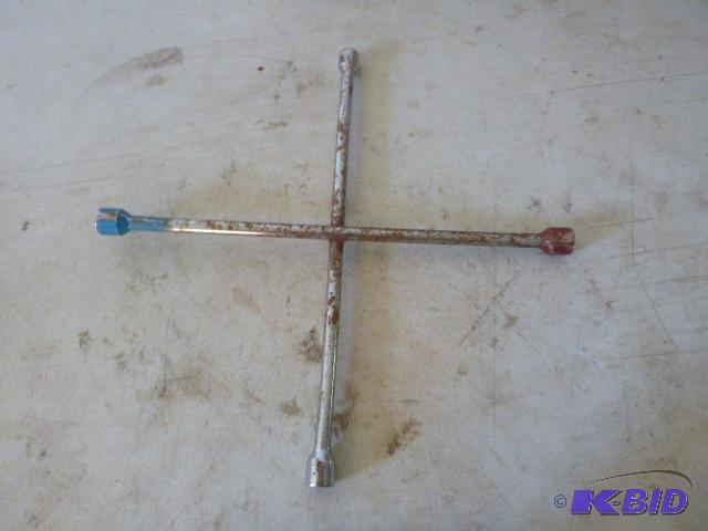 lot 198 image: 4-Way Tire Wrench...