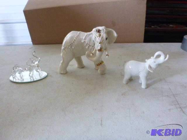lot 26 image: Three Elephant Figurines...