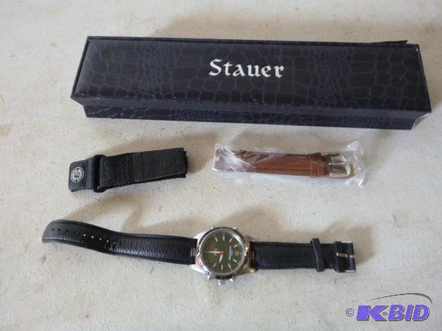 lot 35 image: Stauer Watch With three different bands and c...