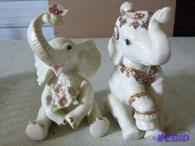 lot 56 image: Two Glass Elephant Figurines...