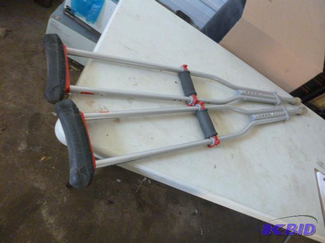 lot 71 image: Aluminum Crutches...