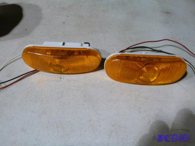 lot 84 image: Two 7" Amber 12 Volt Lights...