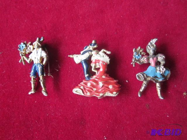 lot 10 image: Lot of (3) Antique enameled over metal brooch...