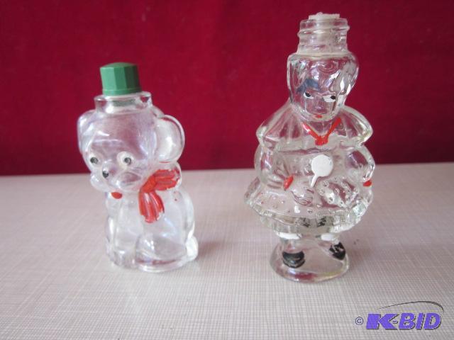 lot 100 image: Pair of vintage glass bottles....