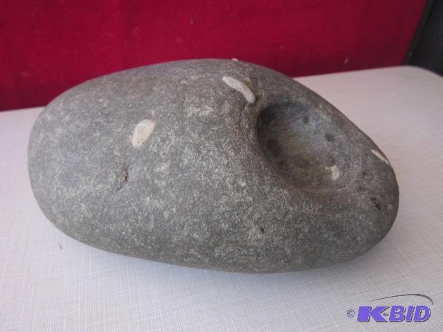 lot 103 image: Large primitive finger pitted Native hammer S...