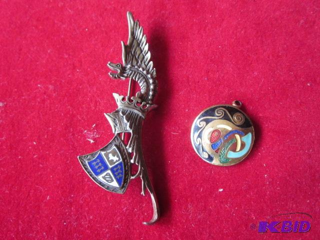 lot 11 image: Coat of arms metal brooch and enameled metal ...