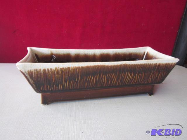 lot 114 image: Unmarked Hull drip glaze planter. ...