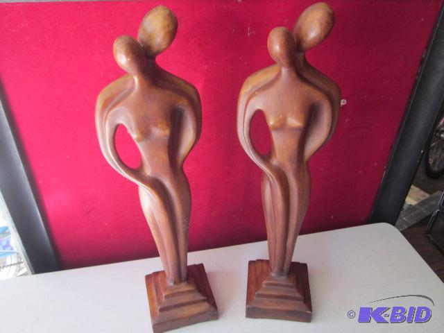 lot 125 image: Pair of wood tone 13 inch statues....