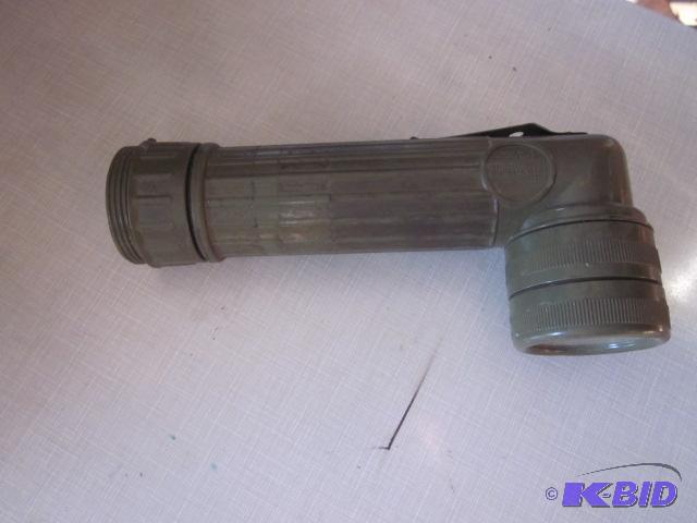 lot 141 image: US issued flash light. ...