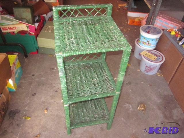 lot 145 image: Three tiered green wicker shelf....