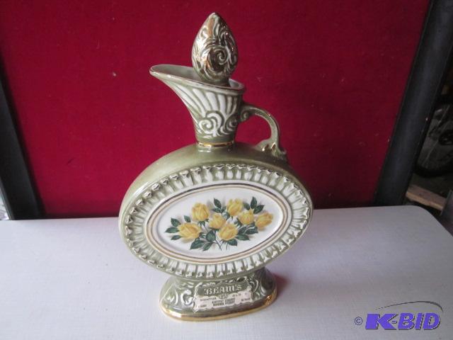 lot 54 image: Vintage Jim Beam bottle, no liquor inside....