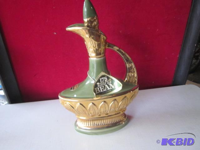 lot 55 image: Vintage Jim Beam bottle, no liquor inside....