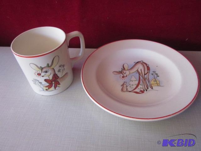 lot 63 image: 1940s Rudolph Red Nose Reindeer, cup and pla...