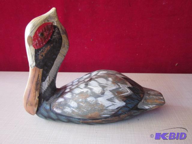 lot 82 image: Hand carved wooden and painted 7 inch pelican...