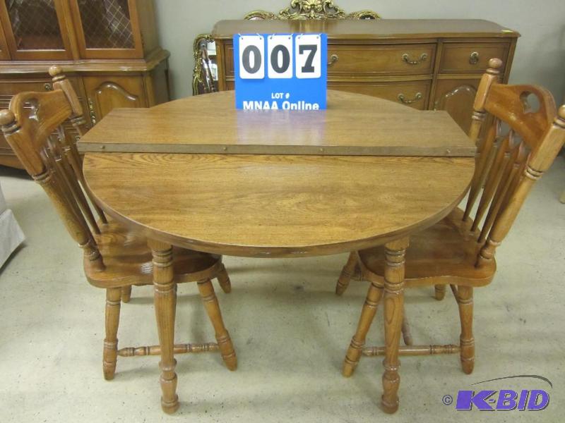 lot 7 image: Round Wood Dining Room Table, 2 Chairs & Leaf