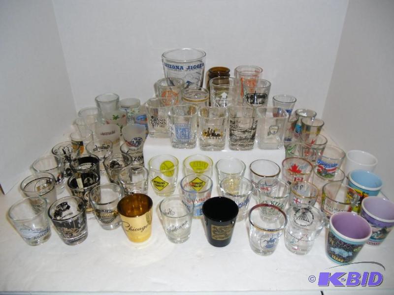 lot 20003 image: 63 Shot Glasses - Vintage Souvenirs - US Cities & Canada
