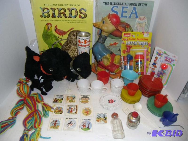 lot 20013 image: 1960s Girls Toys - Plush Scottie Dogs, Miniature Dishes, Jacks, Pick-up Sticks, Dy-Dee Baby Bottle