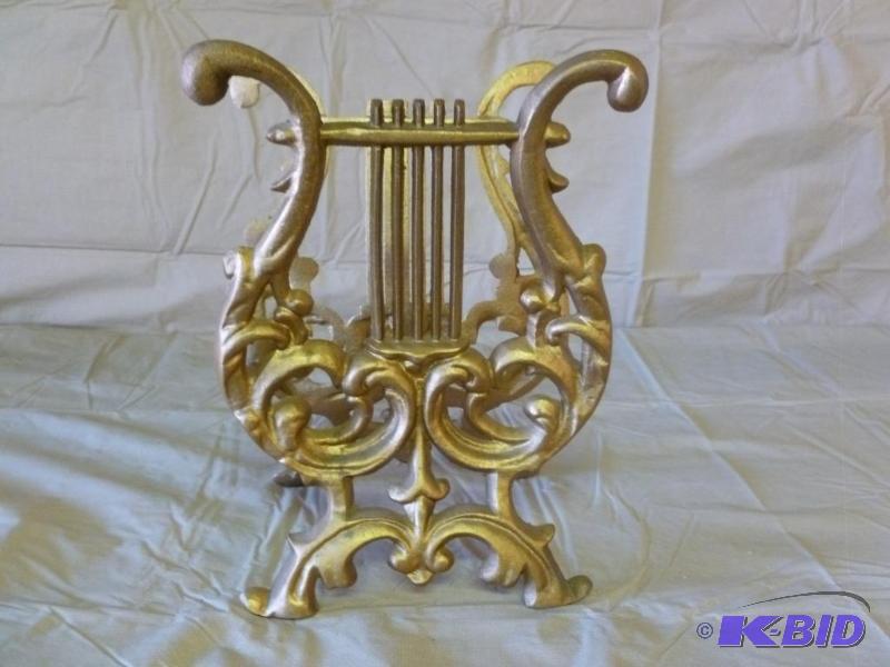 lot 111 image: Vintage painted cast metal music book rack th...