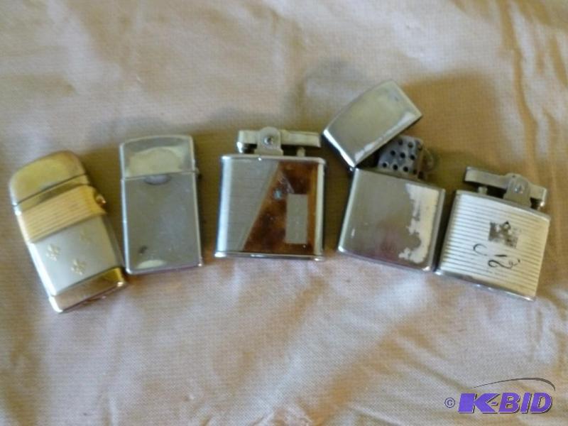 lot 15 image: Lot of five collectible lighters, some vintag...