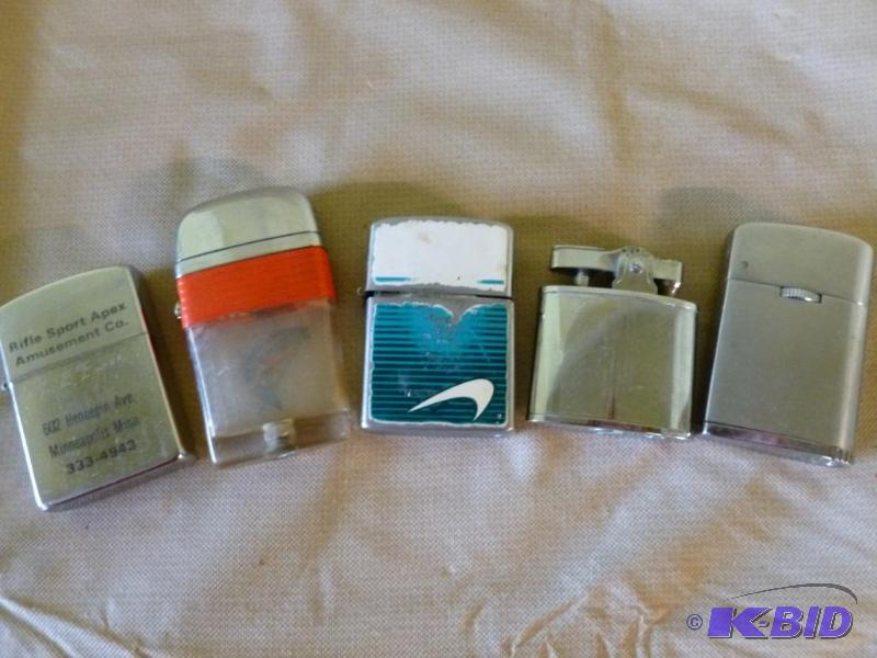 lot 16 image: Lot of five collectible lighters, some vintag...
