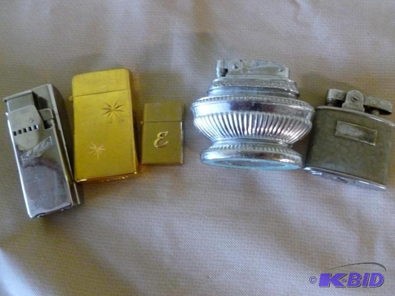 lot 18 image: Lot of five collectible lighters, some vintag...