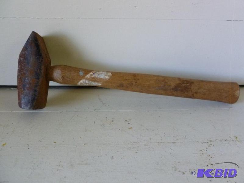 lot 182 image: Heavy duty three pound wood handled hammer....