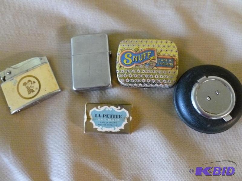 lot 19 image: Lot of two collectible lighters, vintage meta...