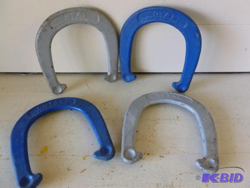 lot 197 image: A set of Royal metal throwing horseshoes....