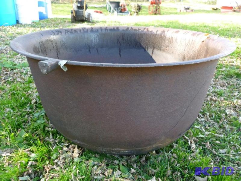 lot 203 image: Large cast iron pot that measures 38" ac...