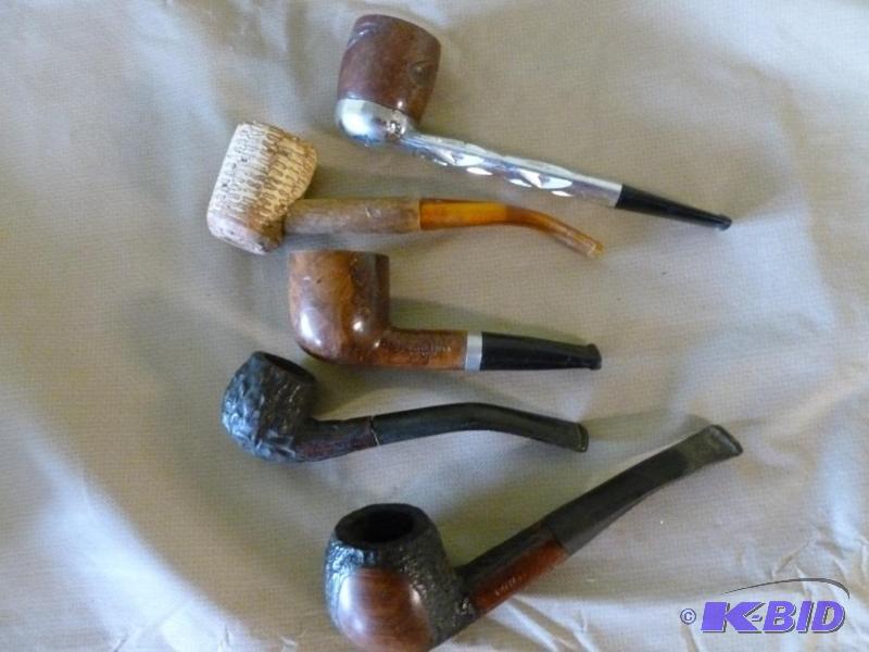 lot 22 image: Lot of five collectible smoking pipes....