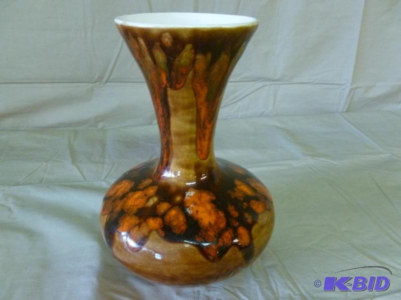 lot 34 image: Beautiful hand glazed porcelain vase that mea...