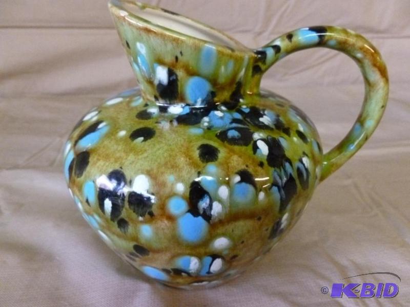 lot 35 image: Beautiful speckled glazed ceramic handled pit...