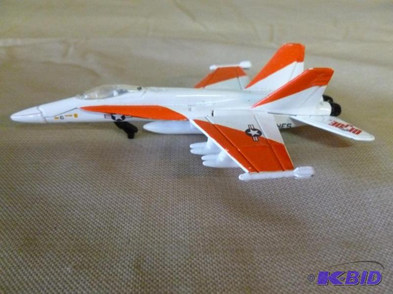 lot 54 image: Collectible F-18C die cast metal airplane tha...