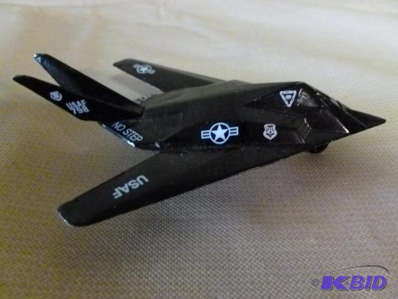lot 55 image: Collectible F-117A Stealth Fighter die cast m...