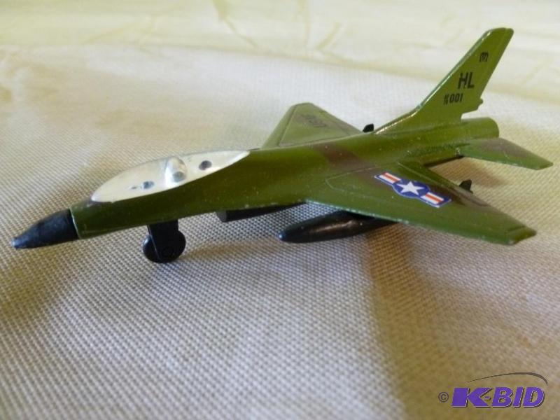 lot 57 image: Collectible die cast metal airplane that meas...